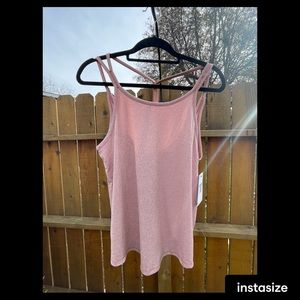 NWT (new with tags) Nike yoga reddish rust colored with white tank. Size Medium